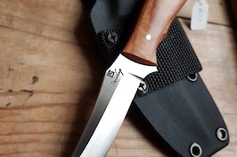 Convex ground trailing point hunter in 14C28N and Permali densified wood.